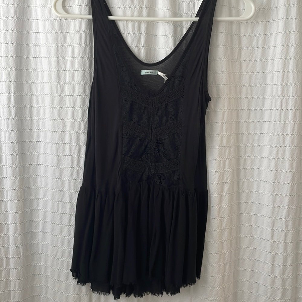 Peplum black top with lace detail